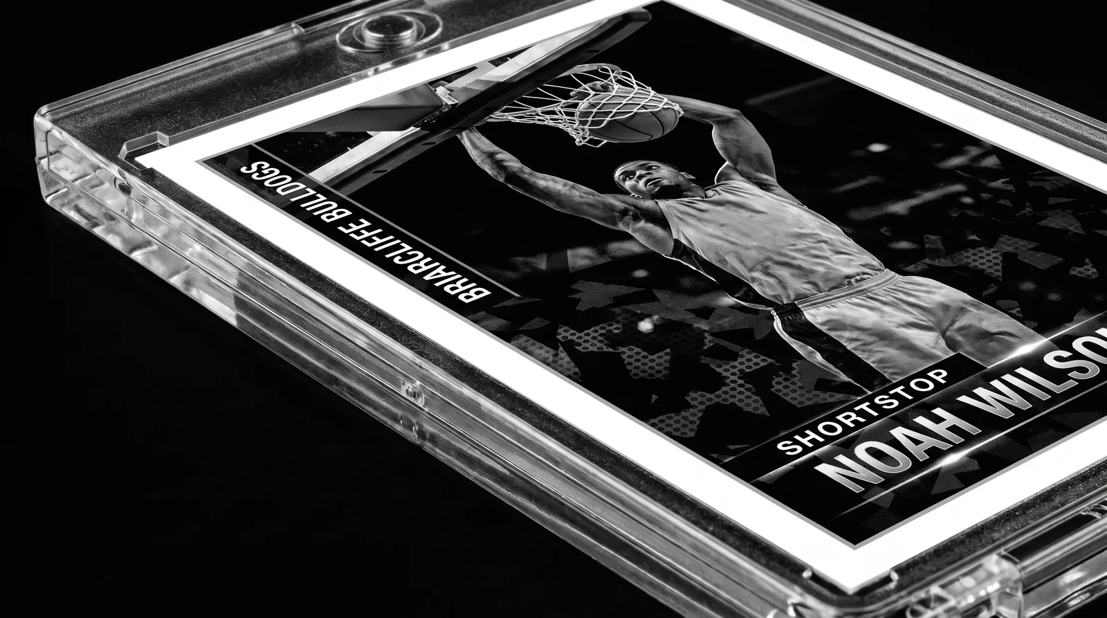 Close-up of a custom black-and-white basketball trading card's foil border inside its magnetic case