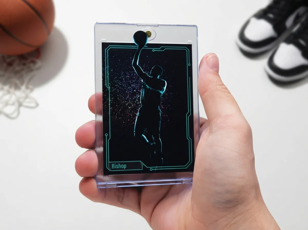 Magnetic case holding dark neon-accented custom sports trading card, basketball player rim-lit mid-jump.