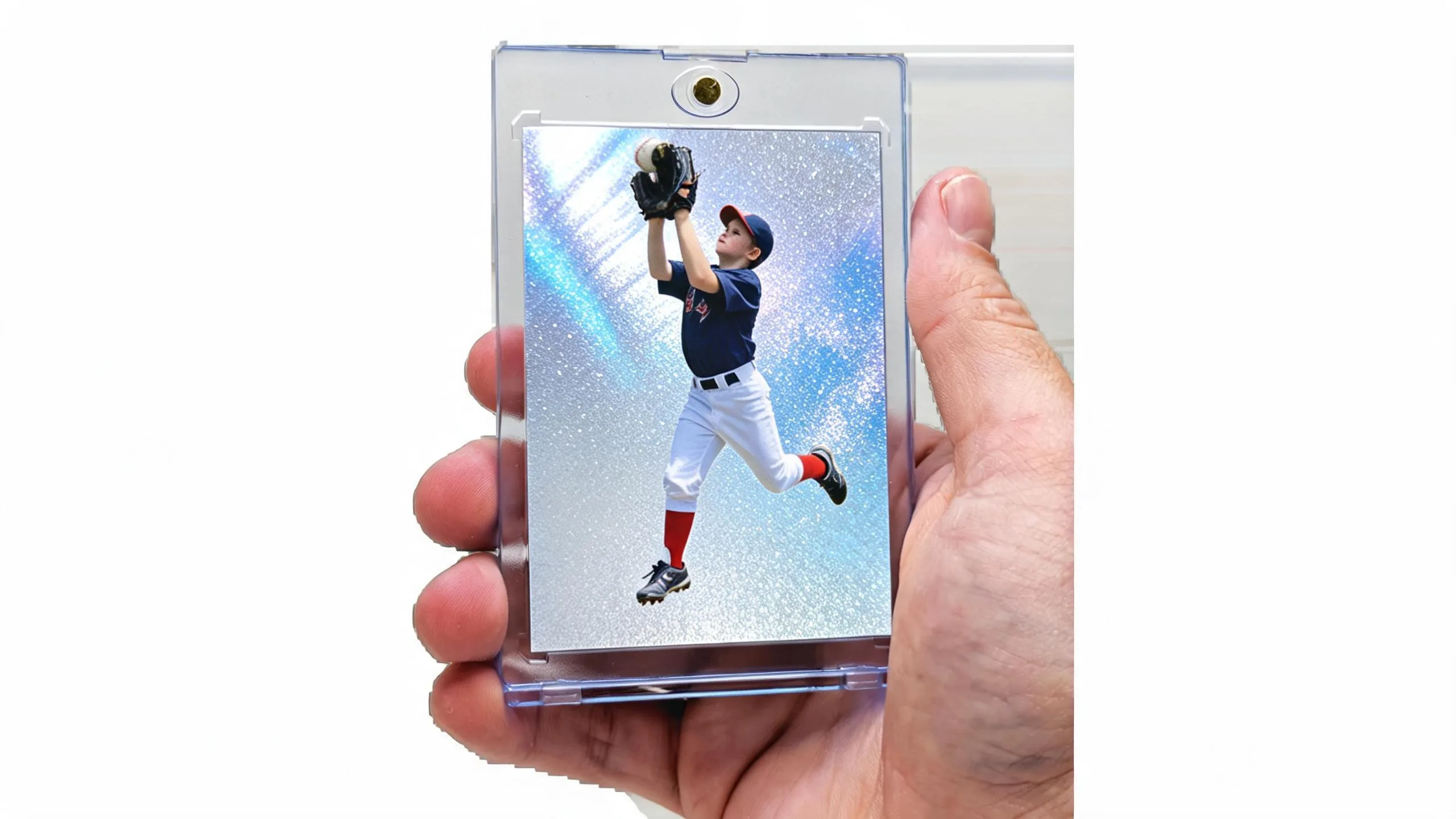 Hand holding magnetic case with sports trading card, a refractor-style gift for 10 year old boy who likes sports