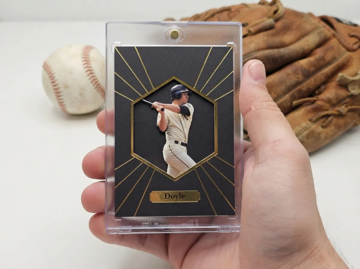 Custom baseball trading card in magnetic case showing gold foil spotlight batter design.