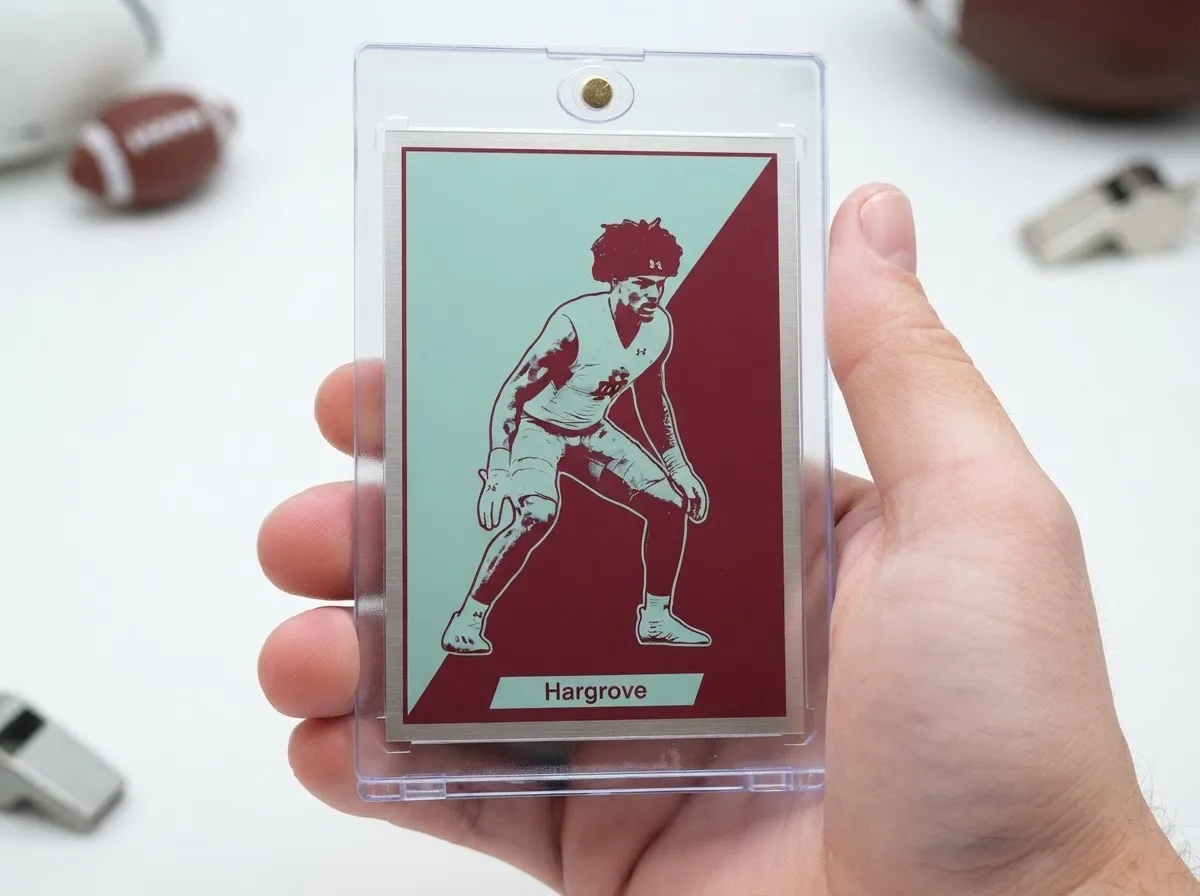Custom sports trading card in magnetic case showing duotone senior athlete portrait design.