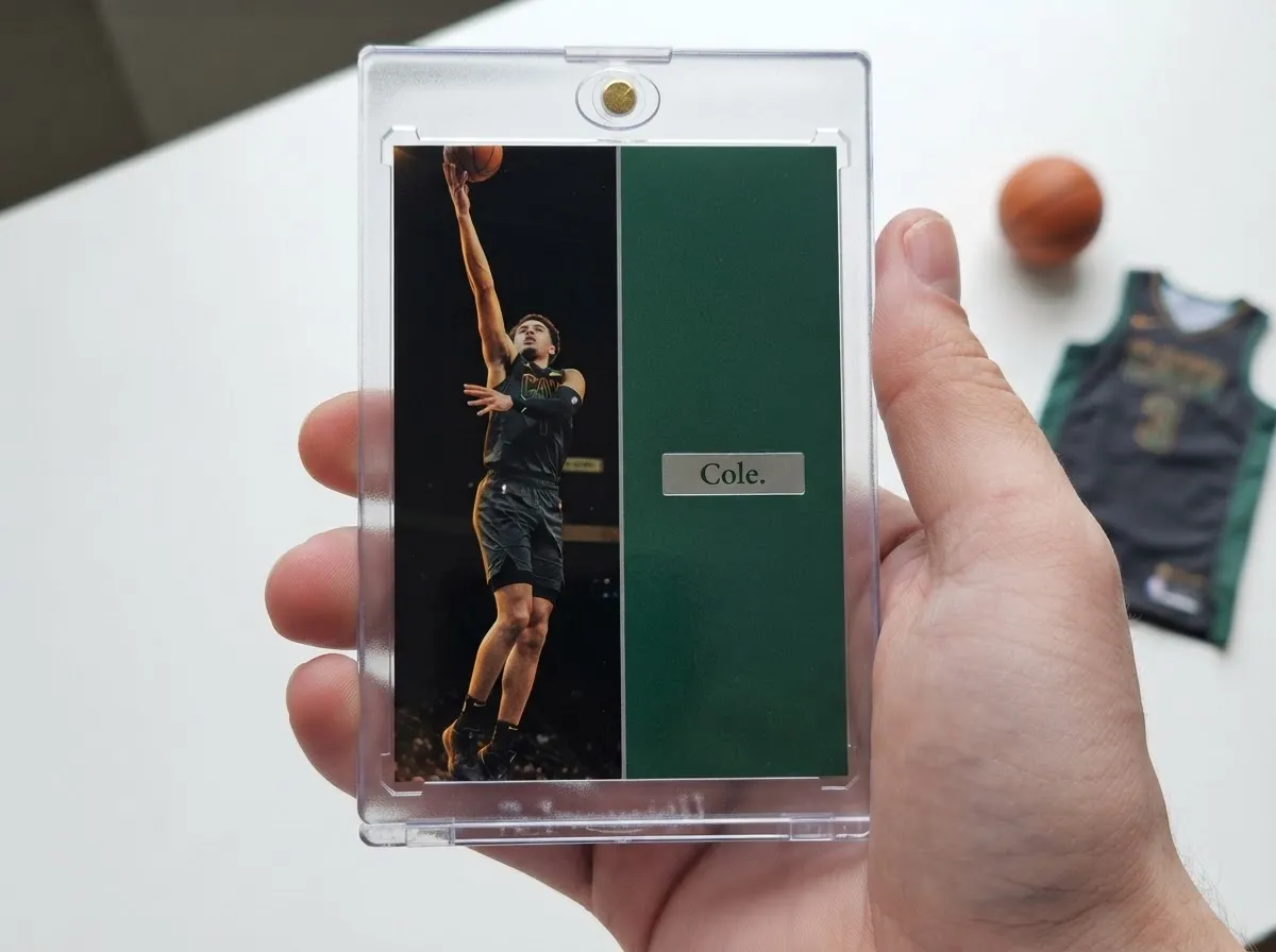 Custom sports trading card in magnetic case showing basketball player on split-panel design.